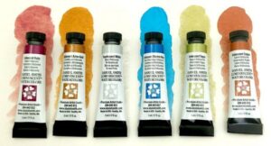 Daniel Smith Jean Haines All That Shimmers Set 6-set med skimrande akvarellfärger i 5 ml tuber för kreativa ljuseffekter och glans i akvarellmåleri.